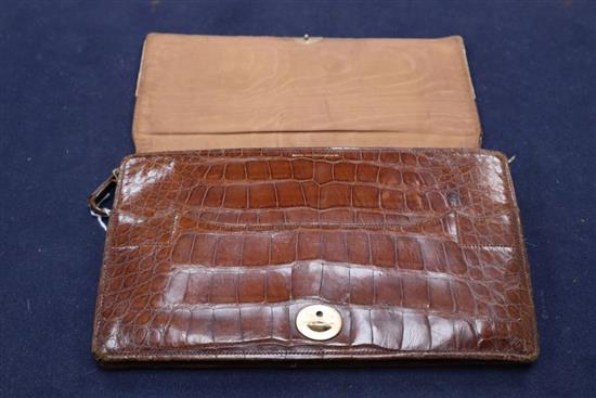 A 9ct gold mounted crocodile skin clutch bag, retailer Davis of Picadilly